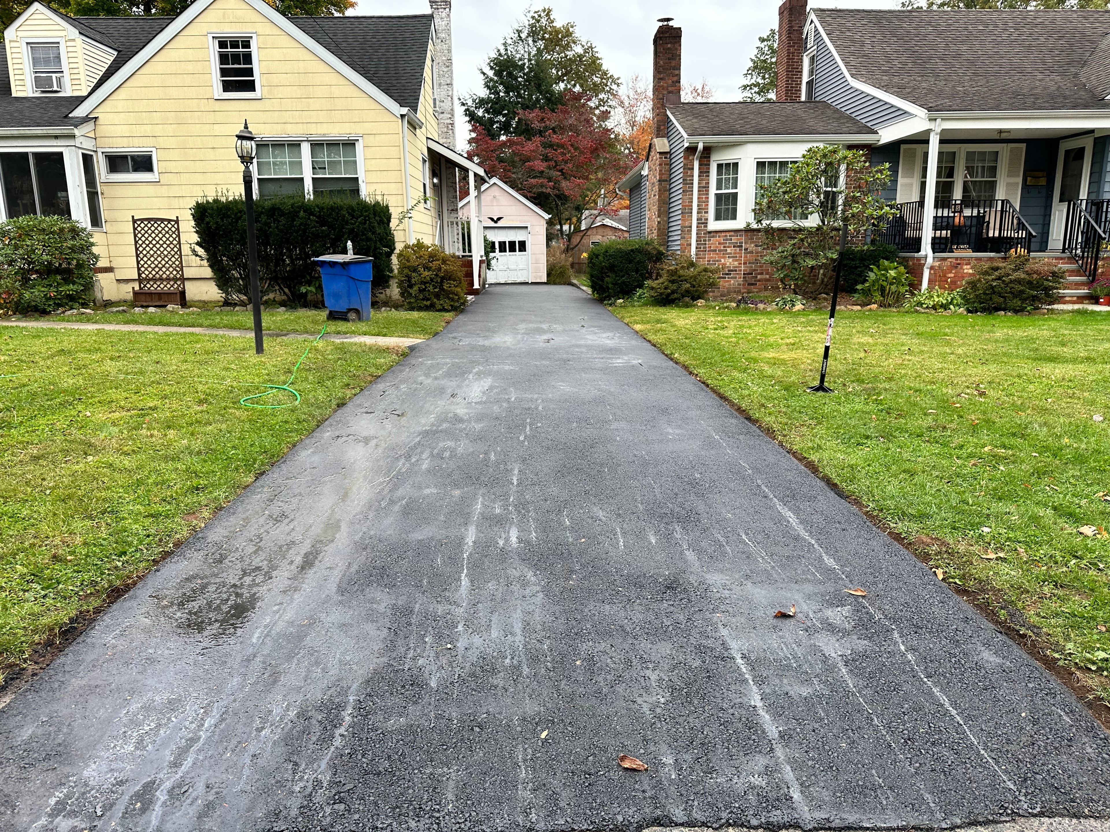 Residential asphalt driveway resurfacing by HomeCraft Paving & Masonry in New Jersey