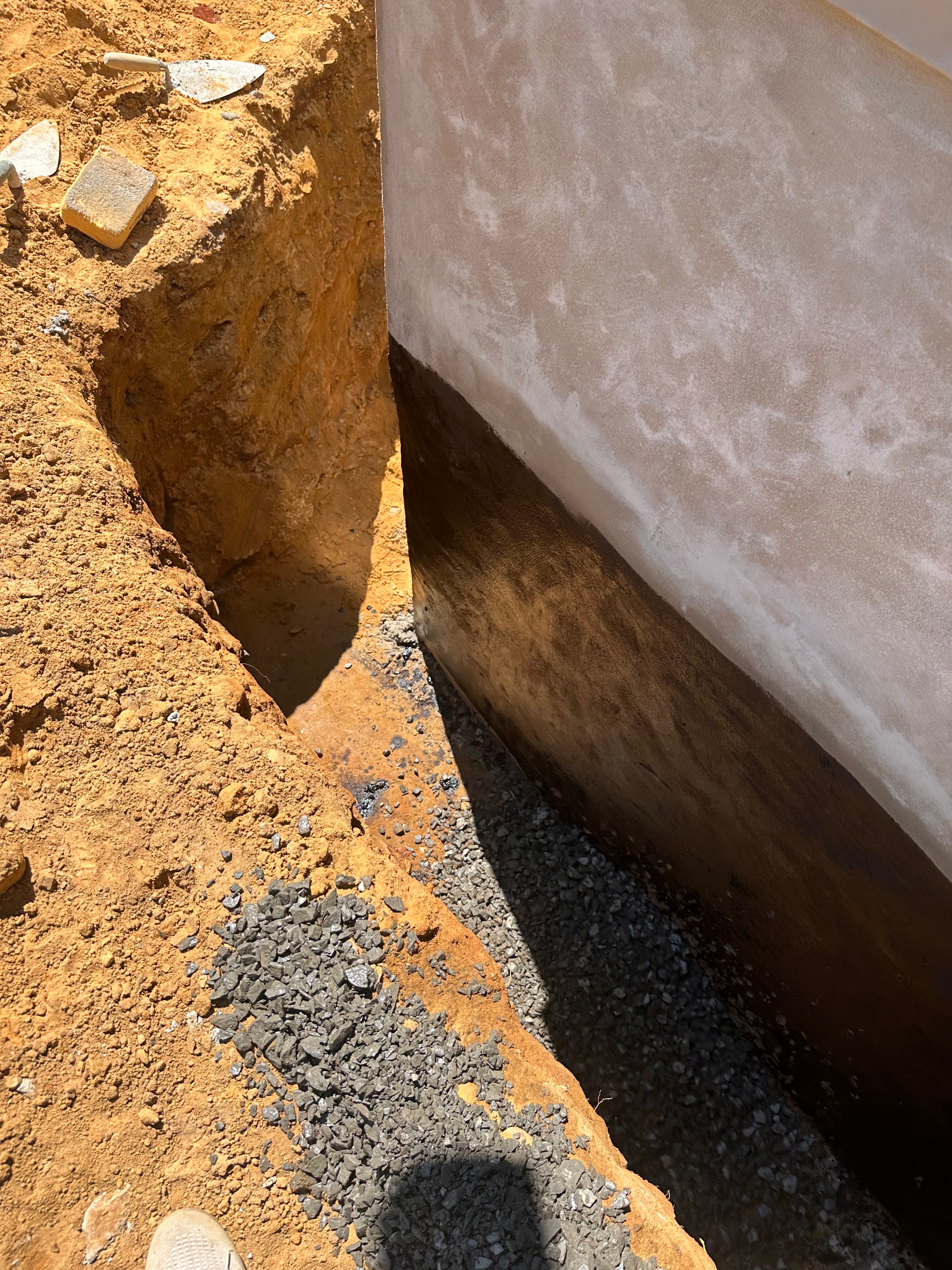 Exterior foundation waterproofing excavation by HomeCraft Paving & Masonry in New Jersey