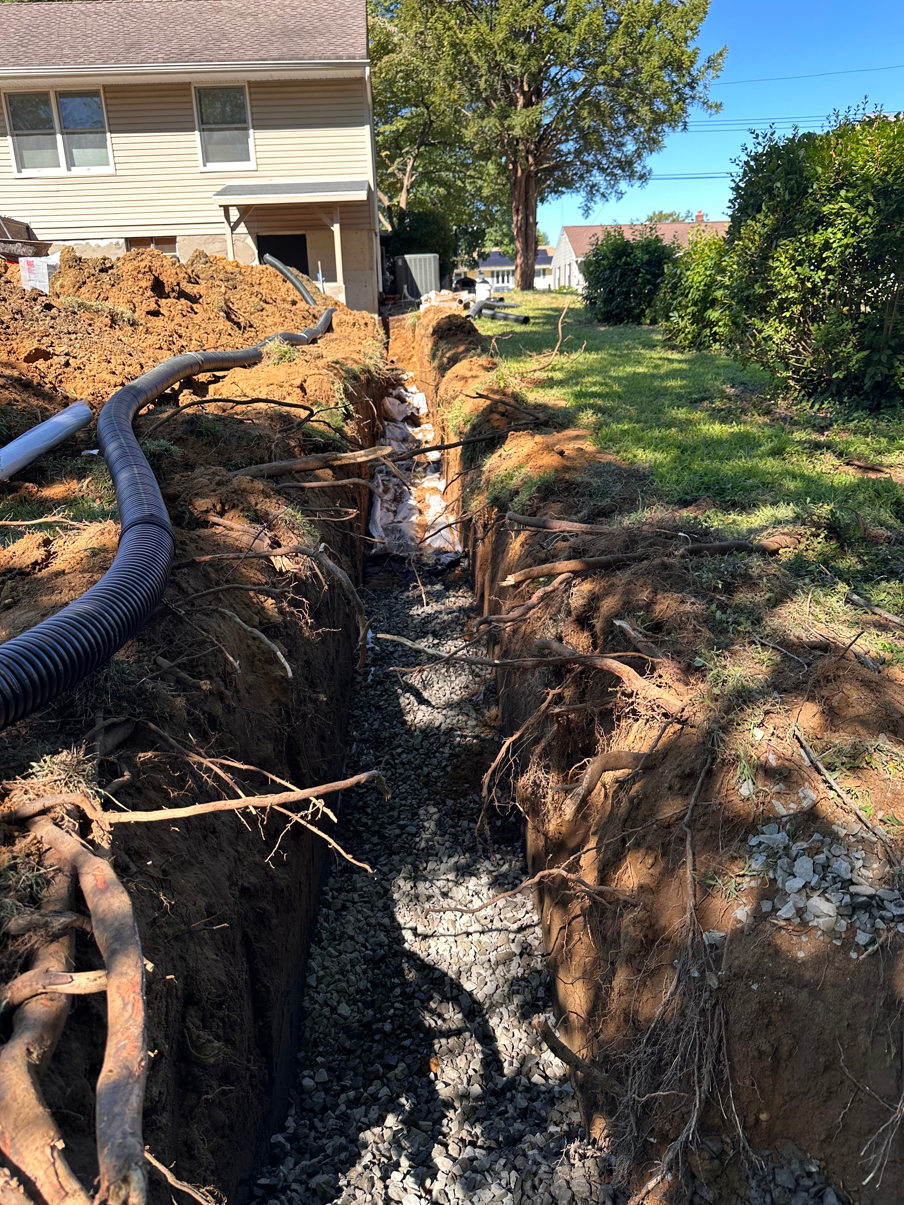 French drain and underground drainage installation by HomeCraft Paving & Masonry in New Jersey