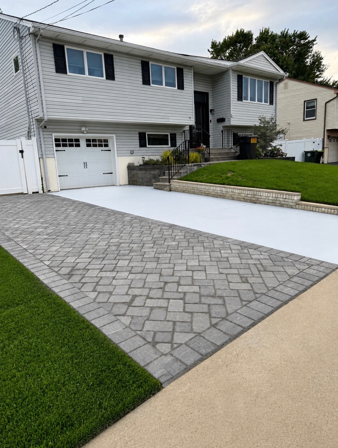 Completed paver driveway and hardscaping project in New Jersey by HomeCraft Paving & Masonry